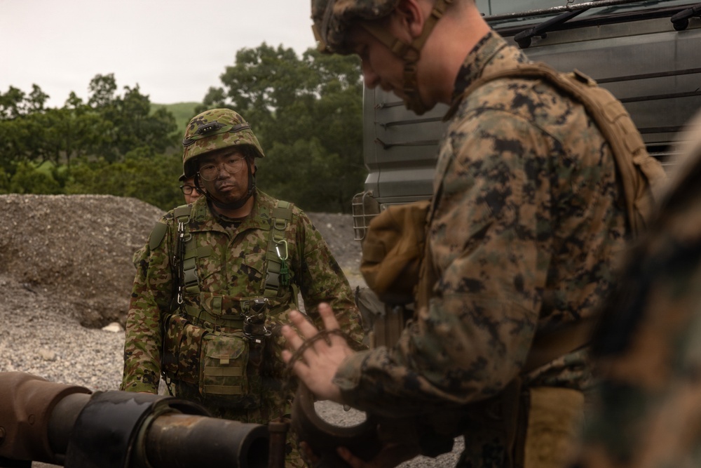 HIJUDAI MANEUVER AREA, OITA, JAPAN – U.S. Marines with 12th Marine Littoral Regiment Rehearse Bilateral Vehicle Recovery Procedures During Exercise Resolute Dragon 26