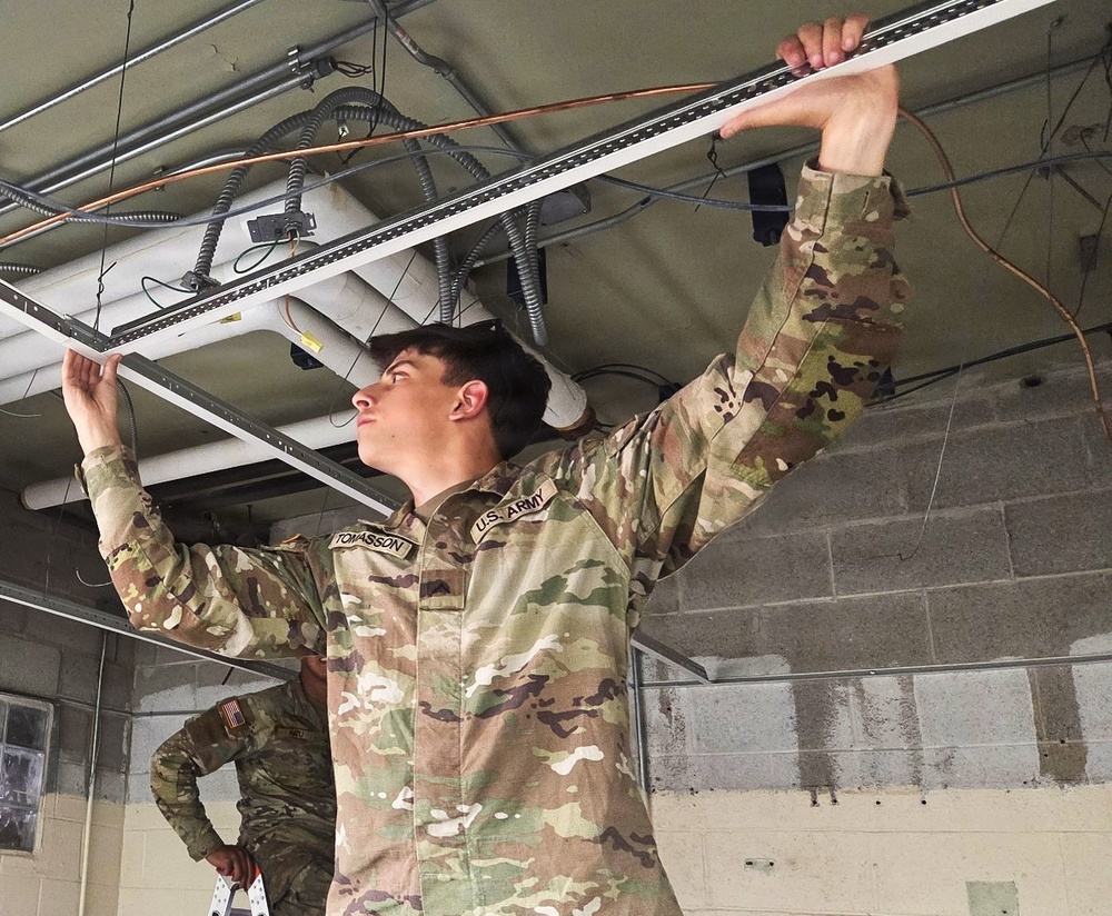 ILLINOIS ARMY NATIONAL GUARD’S 123RD ENGINEER SOLDIERS BUILD RUNNING TRACK AND RENOVATE ARMORY