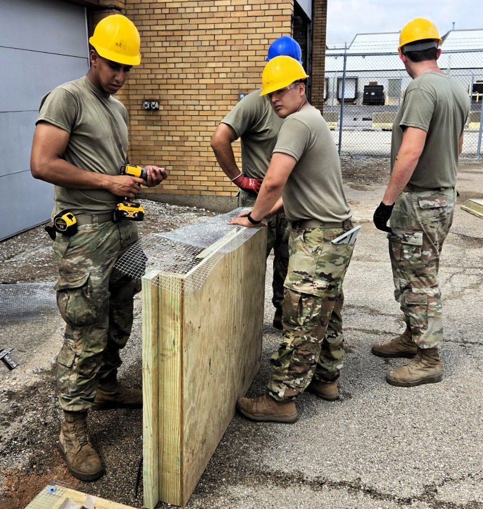 ILLINOIS ARMY NATIONAL GUARD’S 123RD ENGINEER SOLDIERS BUILD RUNNING TRACK AND RENOVATE ARMORY