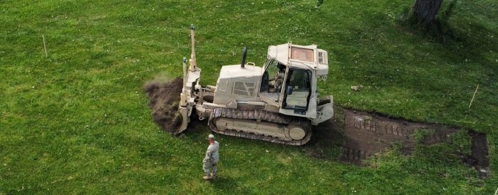 ILLINOIS ARMY NATIONAL GUARD’S 123RD ENGINEER SOLDIERS BUILD RUNNING TRACK AND RENOVATE ARMORY