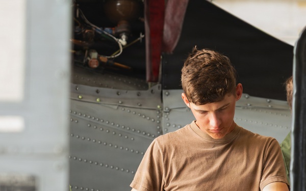 Sailors at Air Test and Evaluation Squadron One perform maintenance