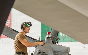 Sailors at Air Test and Evaluation Squadron One perform maintenance