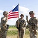 Iowa National Guard brigadier general reenlists soldier during annual training