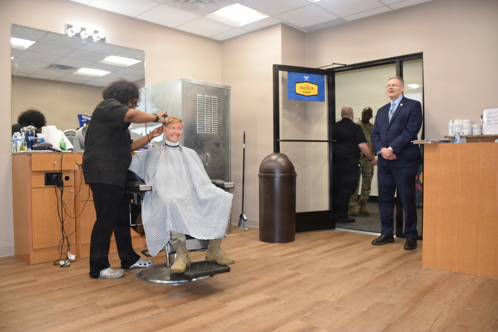 Brig. Gen. Beth Behn receives the first haircut at the new Detroit Arsenal barbershop