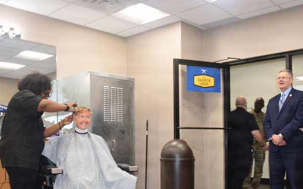 Brig. Gen. Beth Behn receives the first haircut at the new Detroit Arsenal barbershop