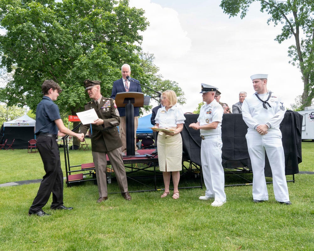 Future service members are recognized at an Our Community Salutes event at Rock Island
