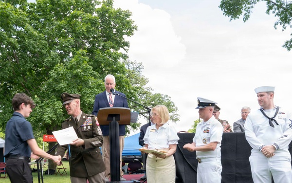 Future service members are recognized at an Our Community Salutes event at Rock Island