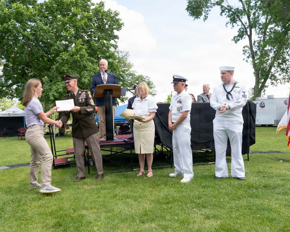 Future service members are recognized at an Our Community Salutes event at Rock Island