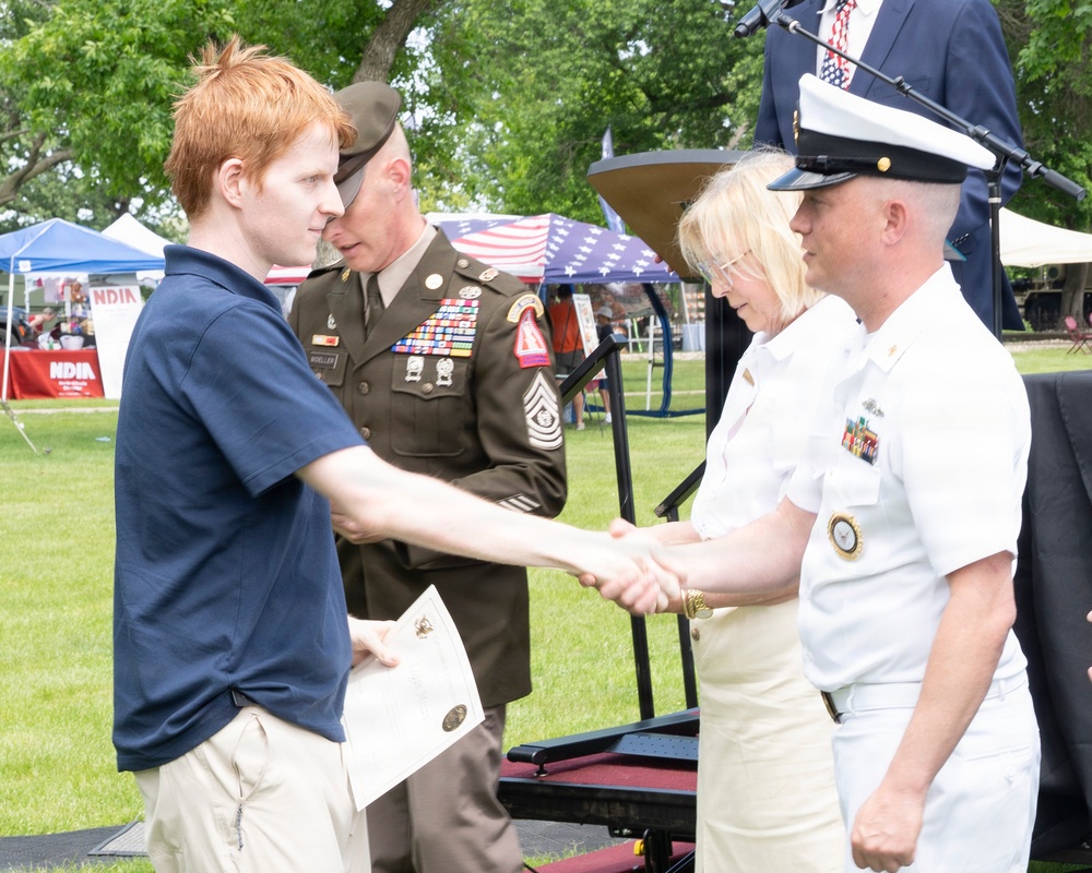 Future service members are recognized at an Our Community Salutes event at Rock Island