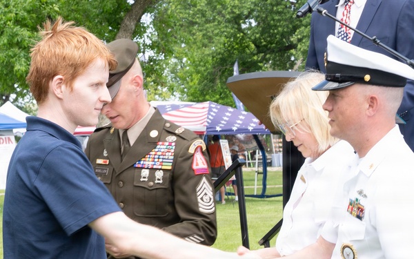 Future service members are recognized at an Our Community Salutes event at Rock Island