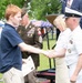 Future service members are recognized at an Our Community Salutes event at Rock Island