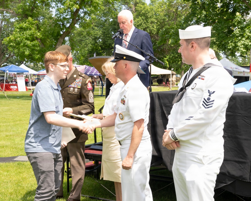 Future service members are recognized at an Our Community Salutes event at Rock Island