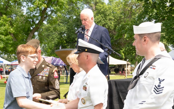 Future service members are recognized at an Our Community Salutes event at Rock Island