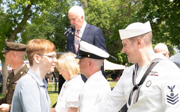 Future service members are recognized at an Our Community Salutes event at Rock Island