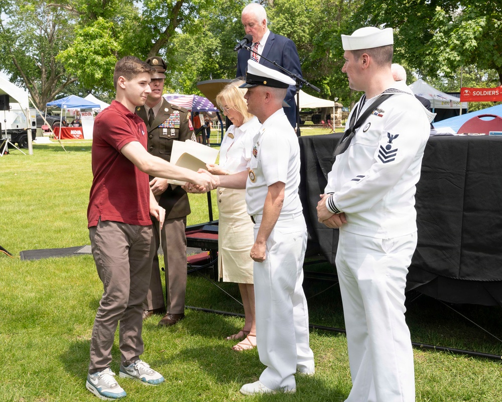Future service members are recognized at an Our Community Salutes event at Rock Island