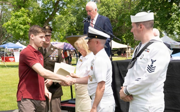 Future service members are recognized at an Our Community Salutes event at Rock Island