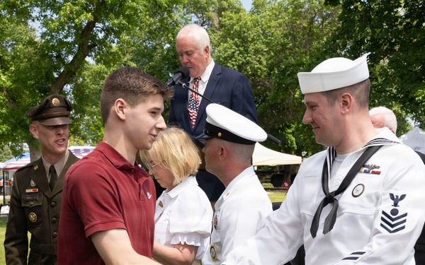 Future service members are recognized at an Our Community Salutes event at Rock Island