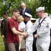 Future service members are recognized at an Our Community Salutes event at Rock Island