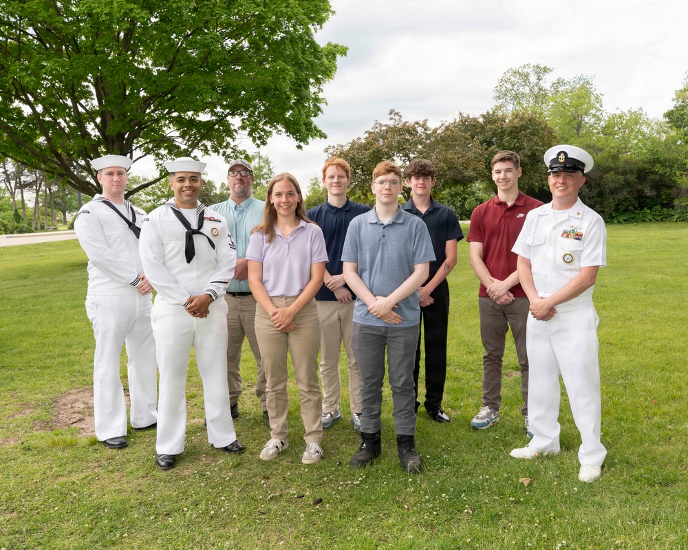 Future service members are recognized at an Our Community Salutes event at Rock Island