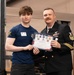 Future Sailors are recognized during an Our Community Salutes event