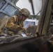 Iowa National Guard soldier performs vehicle maintenance during annual training