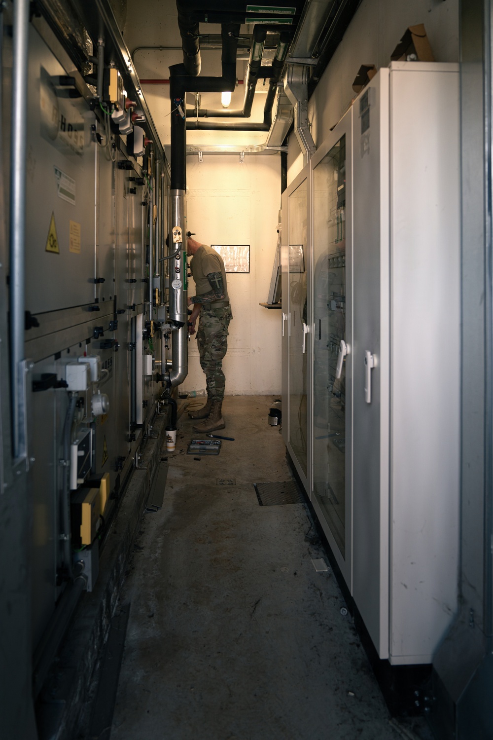 110th Civil Engineers repair Aviano CDC air conditioning