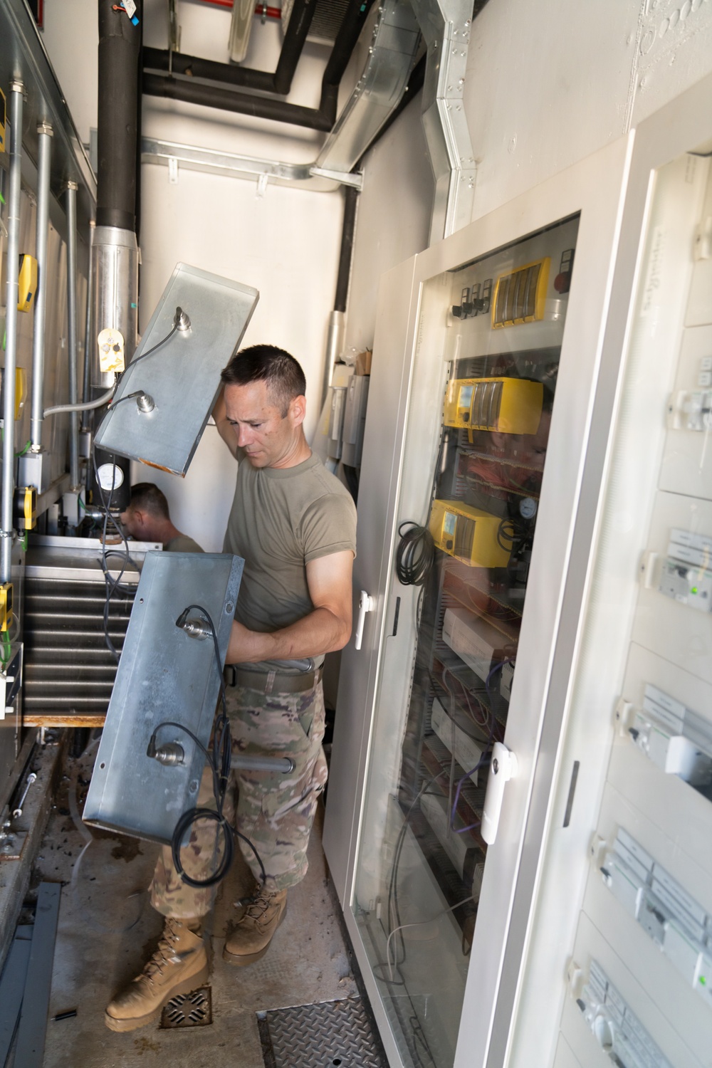 110th Civil Engineers repair Aviano CDC air conditioning