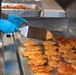 Ronald Reagan Sailors Prepare Food For Opening Of Ships Galley