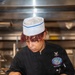 Ronald Reagan Sailors Prepare Food For Opening Of Ships Galley