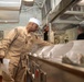 Ronald Reagan Sailors Prepare Food For Opening Of Ships Galley