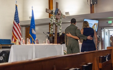 Candles for fallen teammates, “extraordinary Americans”