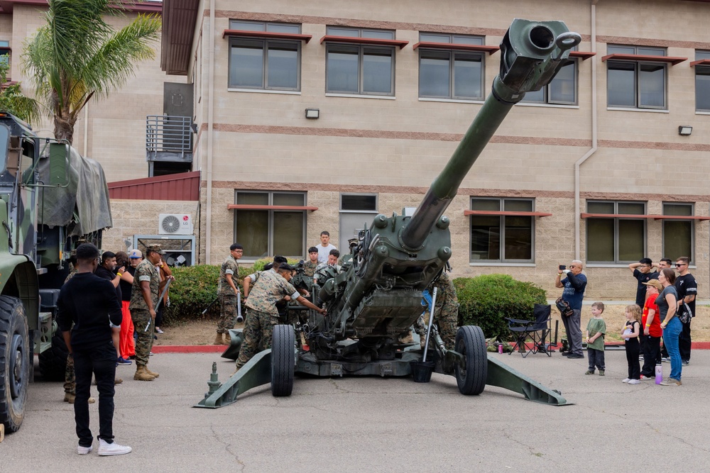 U.S. Marines with 1st Bn., 11th Marine regiment participate in Family Day