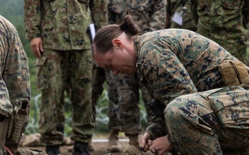 HIJUDAI MANEUVER AREA. OITA, JAPAN – U.S. Marines with 4th LE Demonstrate Techniques for Detainee Handling During Exercise Resolute Dragon 26