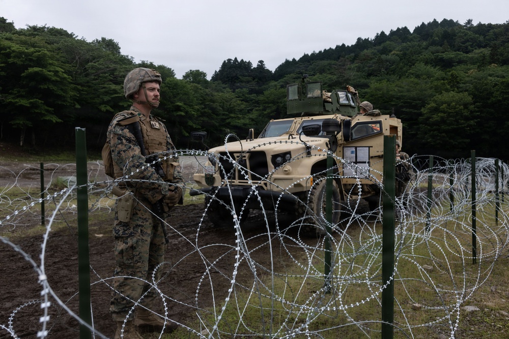 HIJUDAI MANEUVER AREA. OITA, JAPAN – U.S. Marines with 4th LE Demonstrate Techniques for Detainee Handling During Exercise Resolute Dragon 26