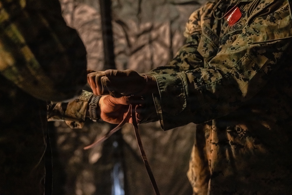HIJUDAI MANEUVER AREA. OITA, JAPAN – U.S. Marines with 4th LE Demonstrate Techniques for Detainee Handling During Exercise Resolute Dragon 26