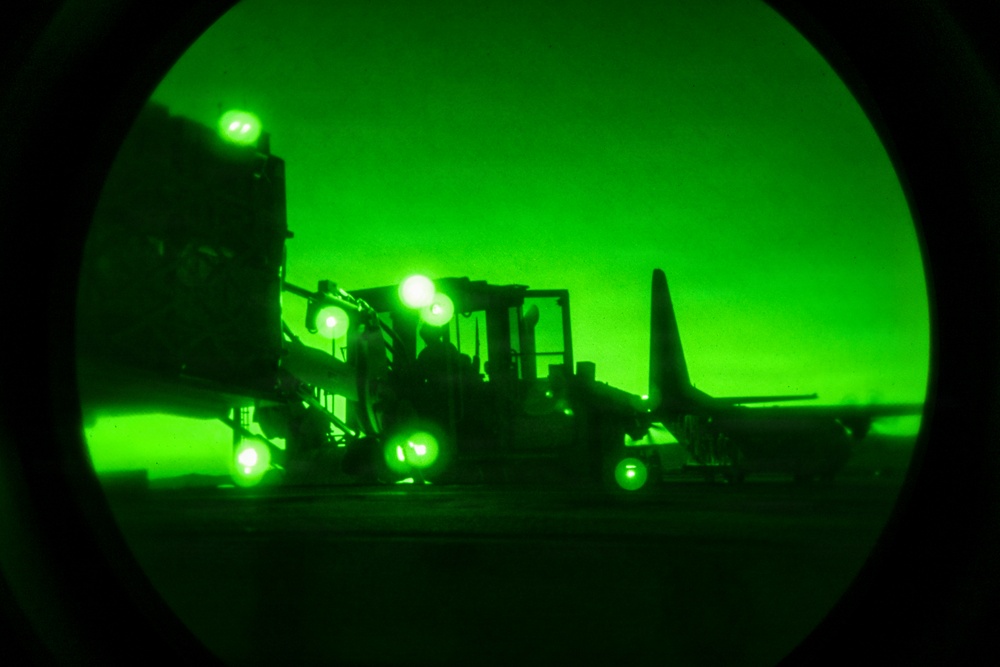 Air transportation specialists unload cargo within the U.S. Central Command area of responsibility