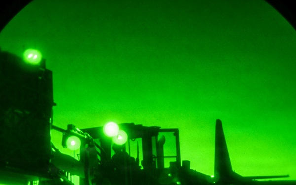 Air transportation specialists unload cargo within the U.S. Central Command area of responsibility
