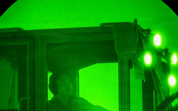 Air transportation specialists unload cargo within the U.S. Central Command area of responsibility