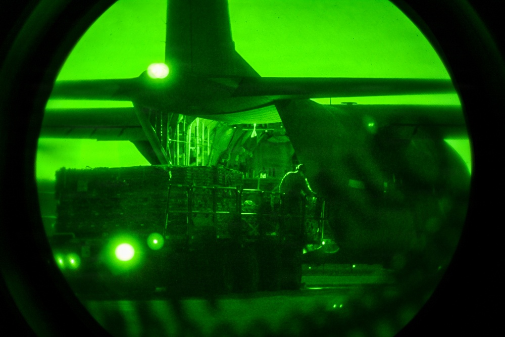 Air transportation specialists unload cargo within the U.S. Central Command area of responsibility