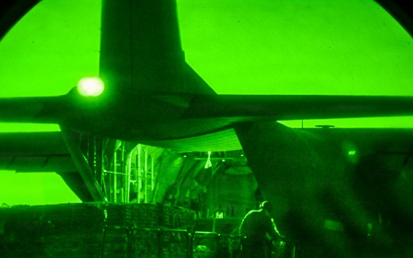 Air transportation specialists unload cargo within the U.S. Central Command area of responsibility