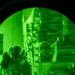 Air transportation specialists unload cargo within the U.S. Central Command area of responsibility