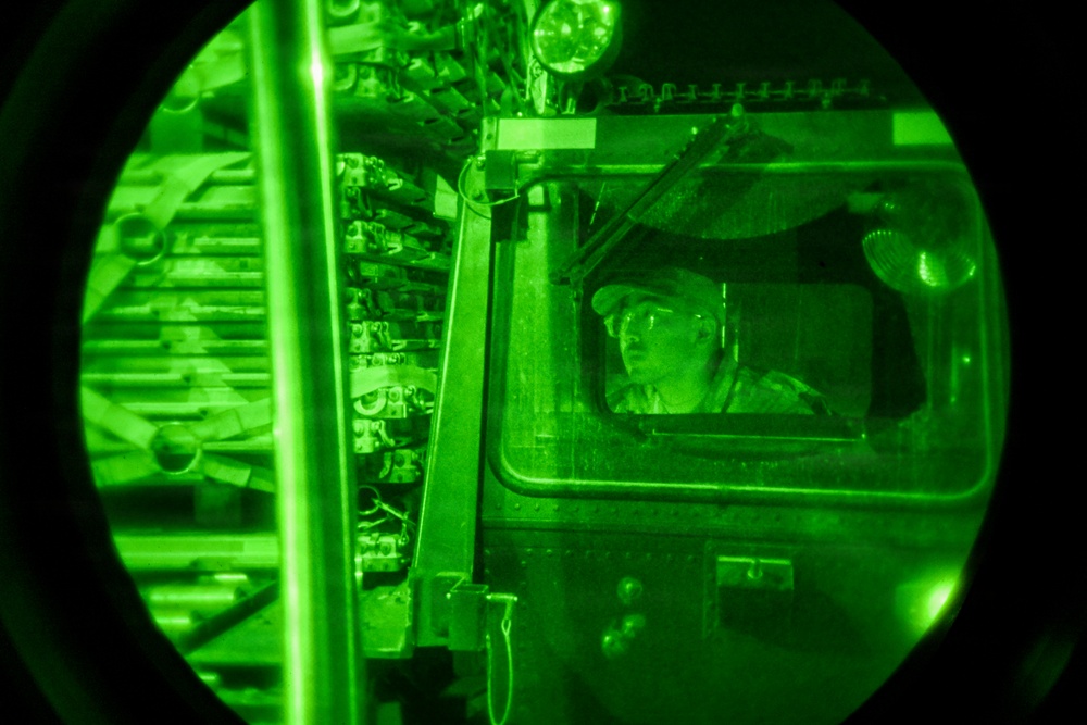 Air transportation specialists unload cargo within the U.S. Central Command area of responsibility