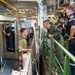 Vice Adm. Doug Perry, commander, U.S. 2nd Fleet, speaks to a French navy sailor