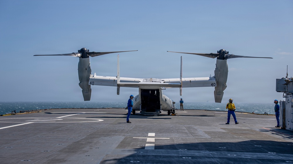 A CMV-22B Osprey is positioned aboard the Mistral-class amphibious assault ship FS Dixmude