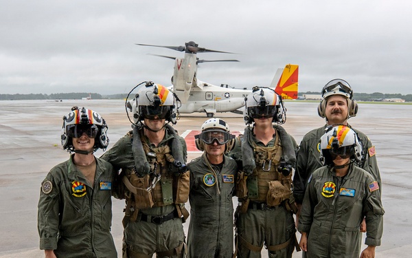 Vice Adm. Doug Perry, commander, U.S. 2nd Fleet, takes a photo with U.S. Navy Sailors from Fleet Logistics Multi-Mission Squadron (VRM) 40