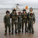 Vice Adm. Doug Perry, commander, U.S. 2nd Fleet, takes a photo with U.S. Navy Sailors from Fleet Logistics Multi-Mission Squadron (VRM) 40