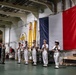 Vice Adm. Doug Perry, commander, U.S. 2nd Fleet, salutes French navy sailors alongside Capt. Jocelyn Delrieu
