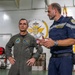 Vice Adm. Doug Perry, commander, U.S. 2nd Fleet, speaks with French navy Capt. Jocelyn Delrieu