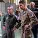 Vice Adm. Doug Perry, commander, U.S. 2nd Fleet, speaks to a French navy sailor