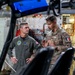 Vice Adm. Doug Perry, commander, U.S. 2nd Fleet, speaks to a French navy sailor